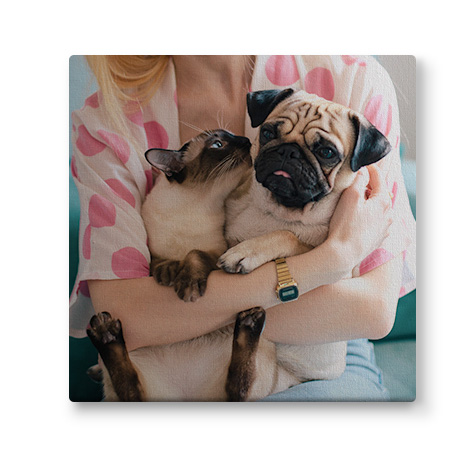 canvas image of women holding pet dog and cat