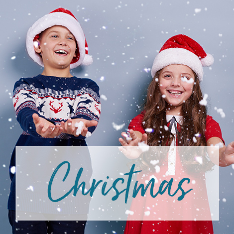 Image of two boys with Christmas gifts