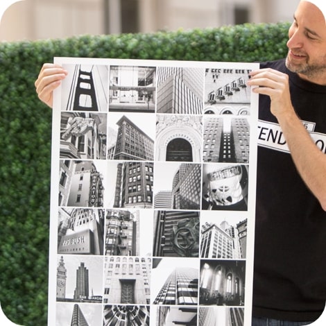man holding a poster 